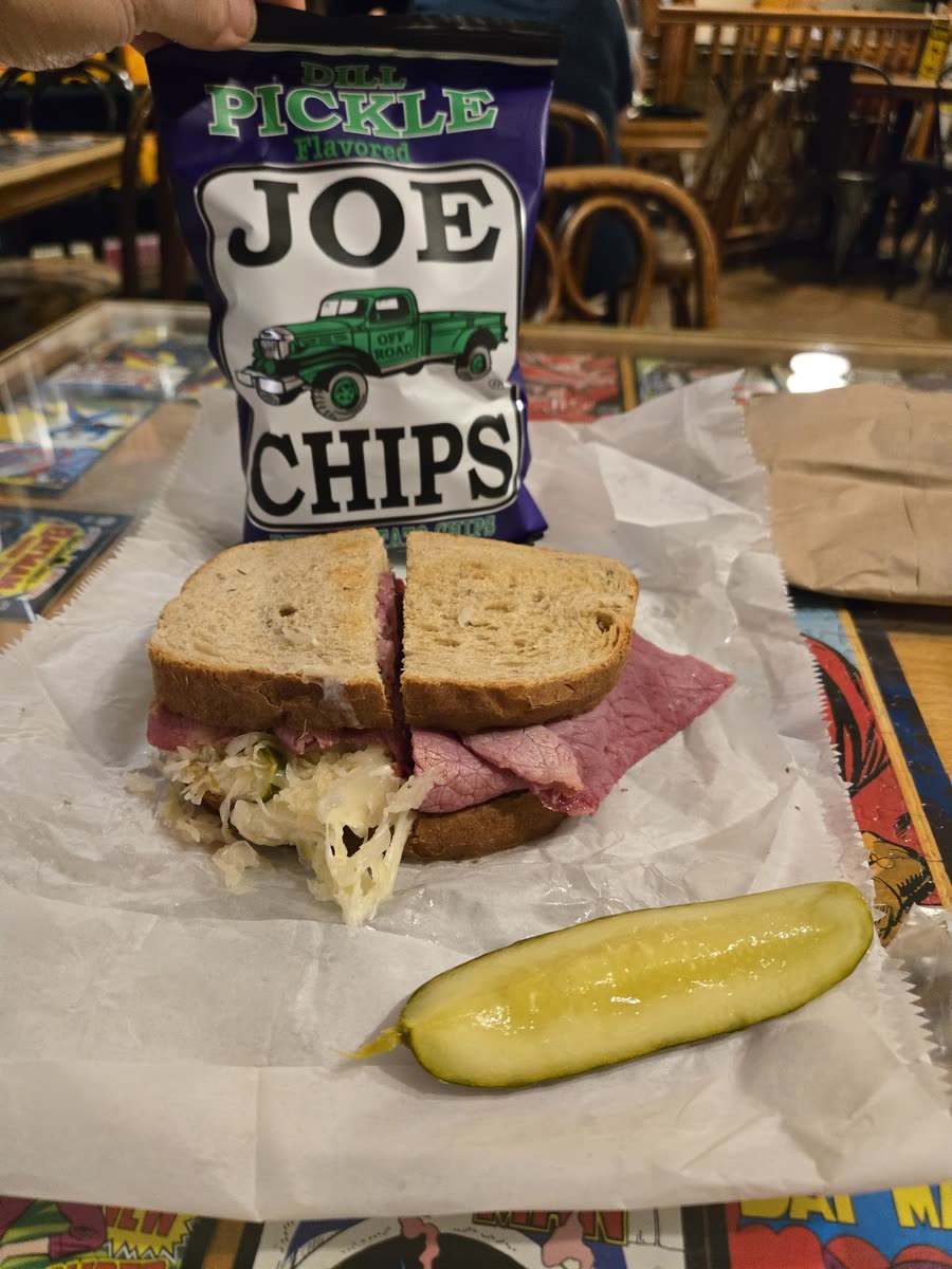 House-made reuben sandwich with a pickle at Gardner's Market